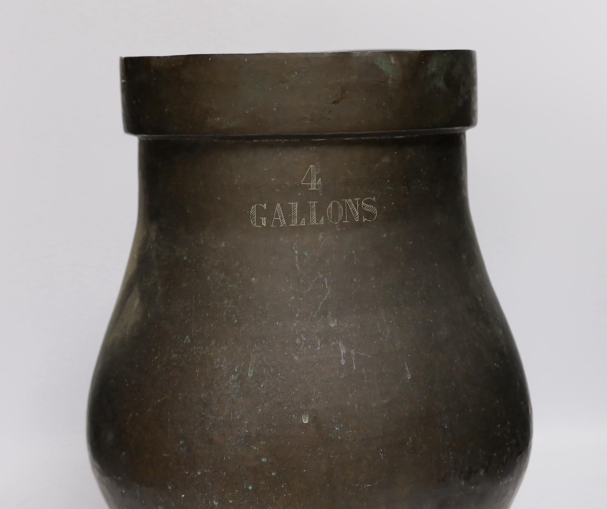 A 19th century large 4 gallon copper measuring jug, 38.5cm high